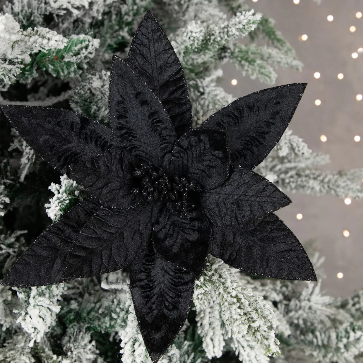 25" Black Glittered Poinsettia Christmas Floral Stem Spray
