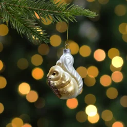3.75" Brown and White Glass Squirrel with Nut Christmas Ornament