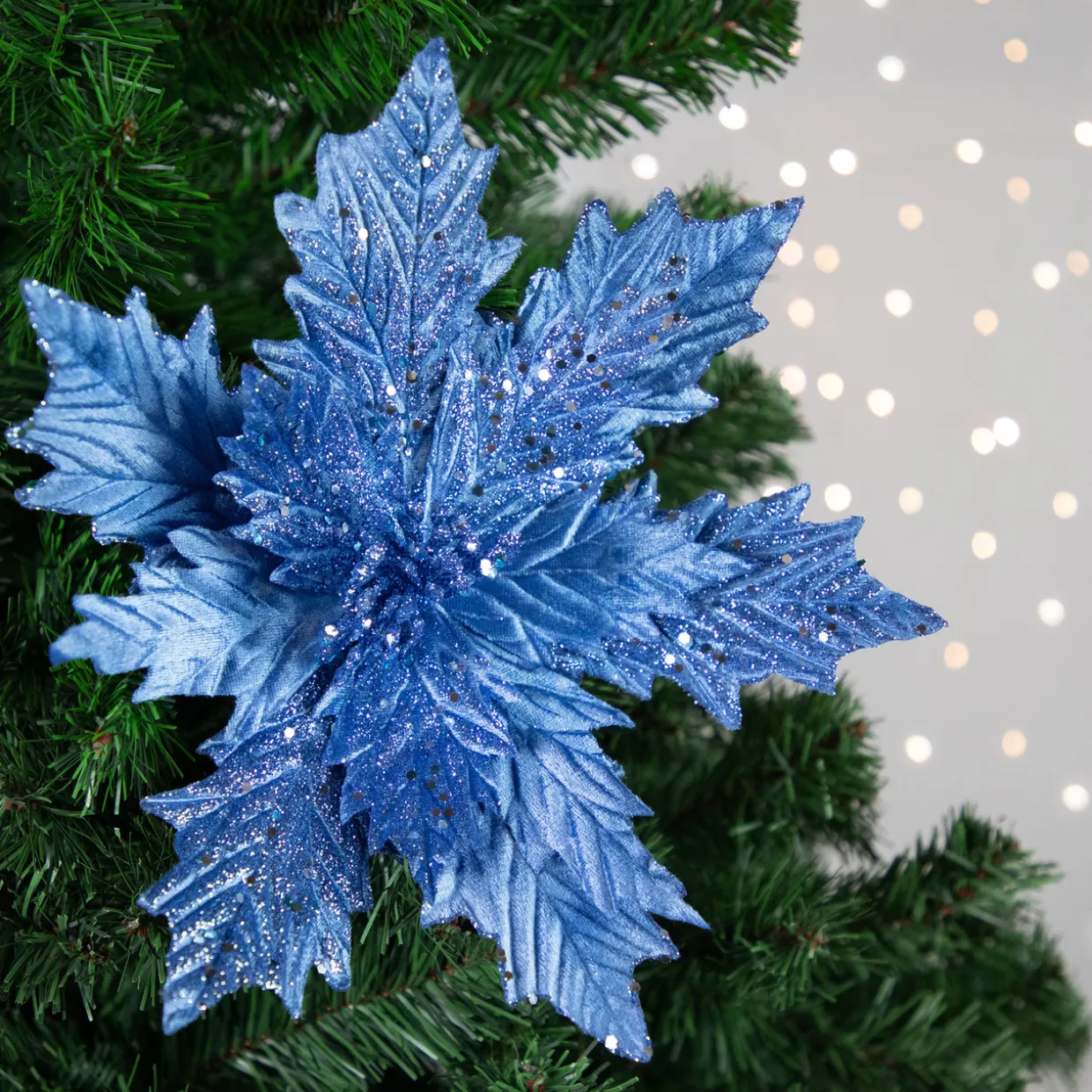 24" Glittered Blue Poinsettia Christmas Stem Spray