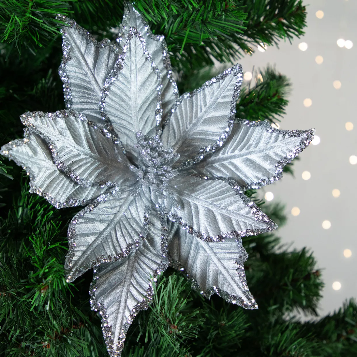 25" Glittered Silver Poinsettia Christmas Stem Spray