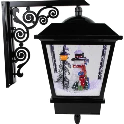 17.75" Lighted and Musical Wall Mounted Snowing Christmas Street Lamp