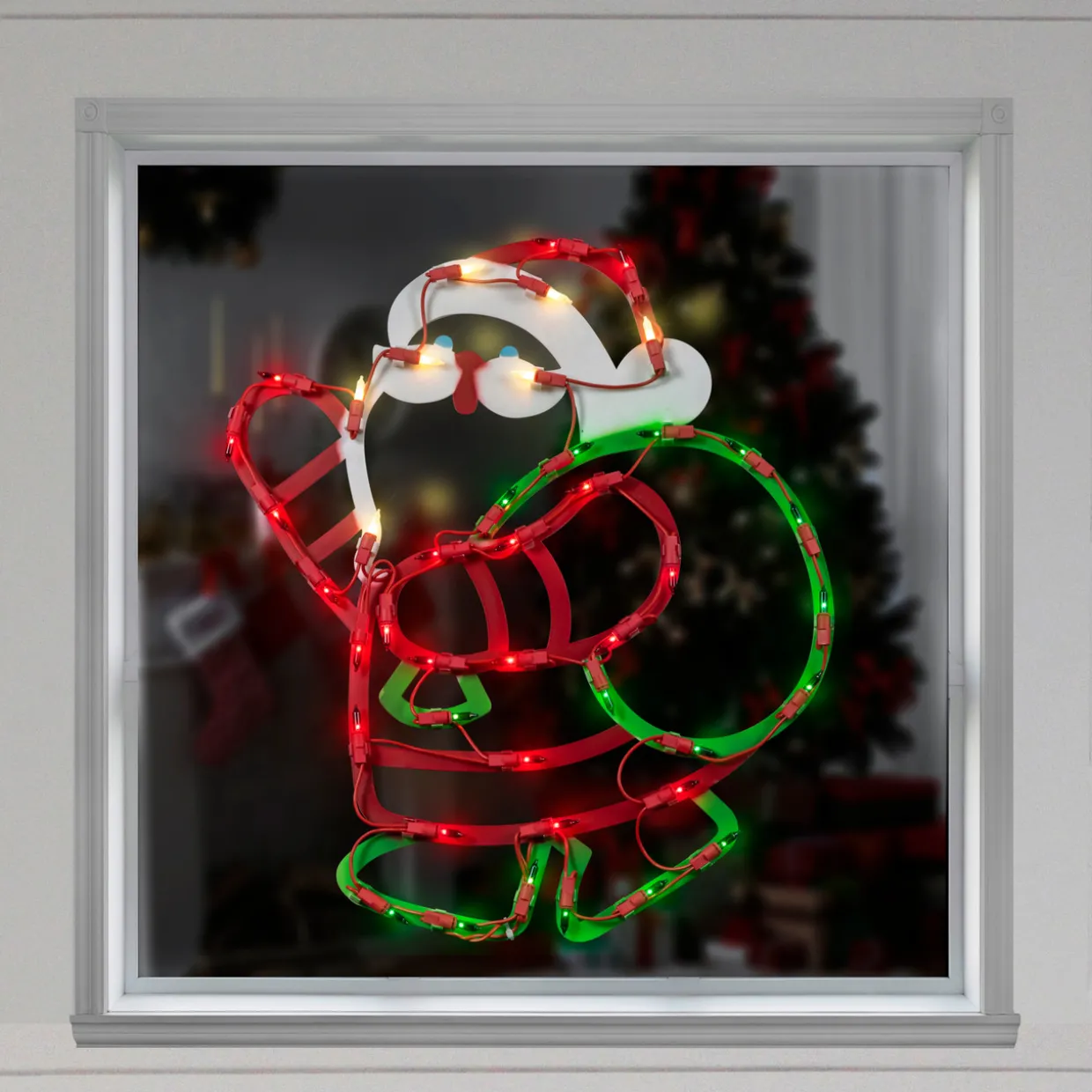 17.5" Lighted Santa Claus with Gift Sack Outdoor Christmas Window Silhouette