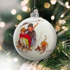 3" Norman Rockwell 'Young Love: Sledding' Glass Christmas Disc Ornament