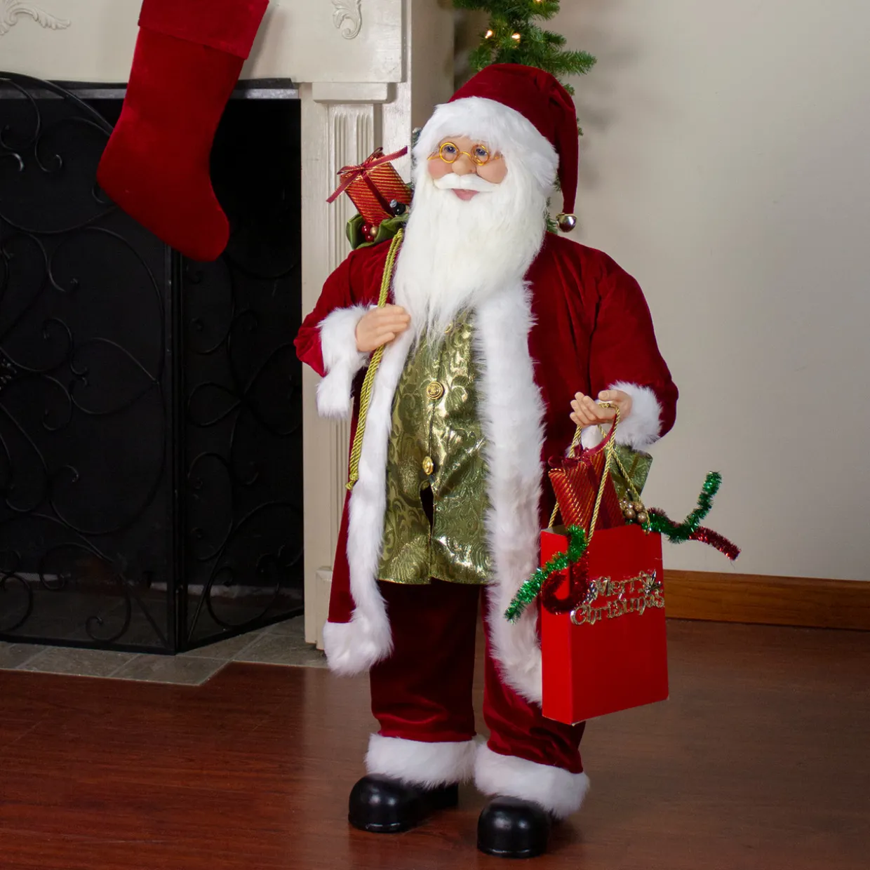 24" Red and White Santa Claus with Gift Bags and Green Vest Christmas Figure