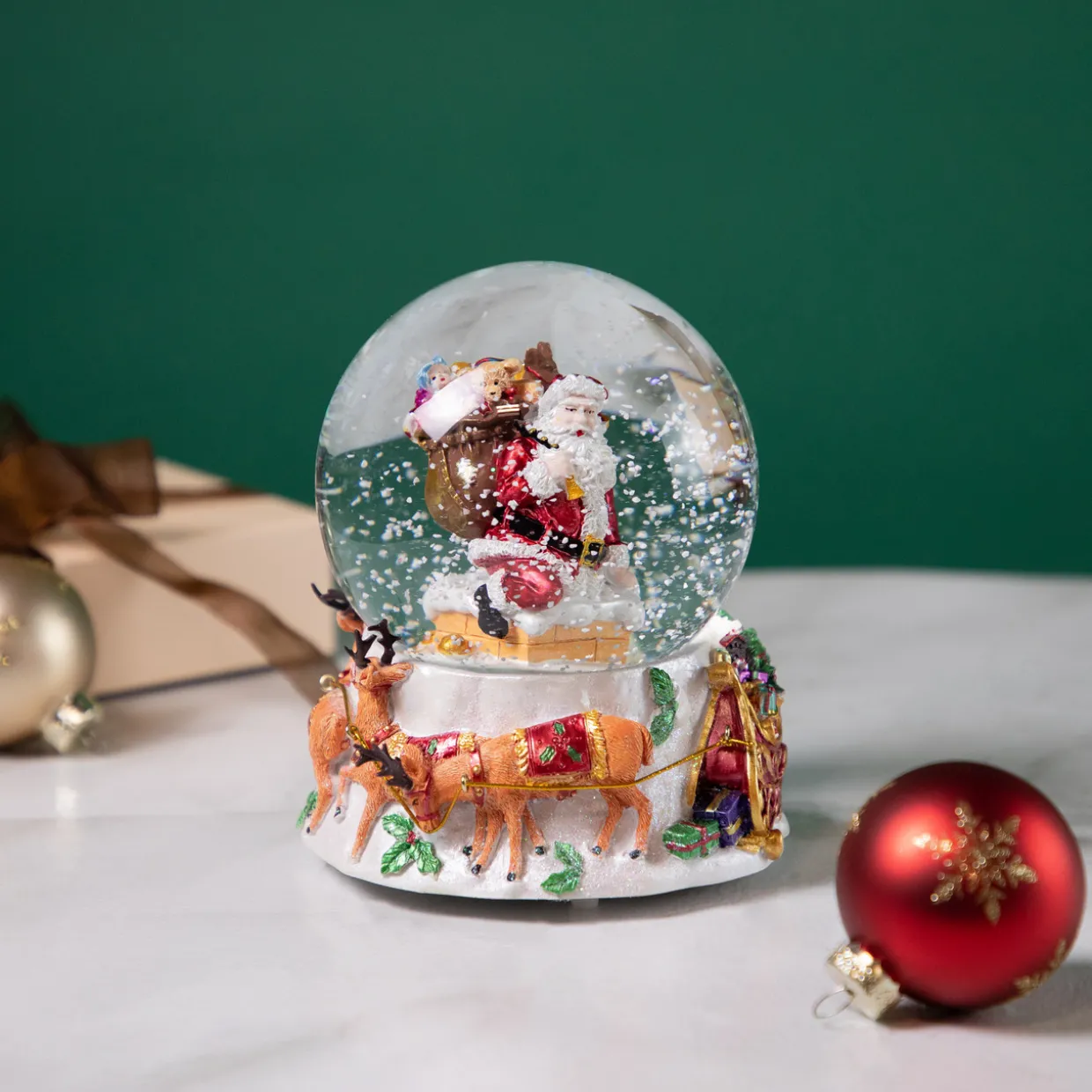 6.5" Santa Delivering Gifts Musical Christmas Snow Globe