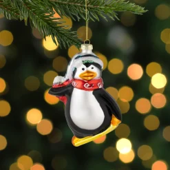 4.25" Snowboarding Penguin Glass Christmas Ornament