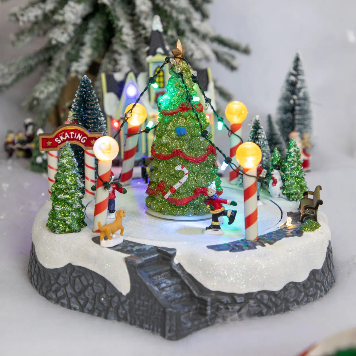 Animated and Musical Ice Skaters Christmas Scene LED Lighted Village Display - 9"