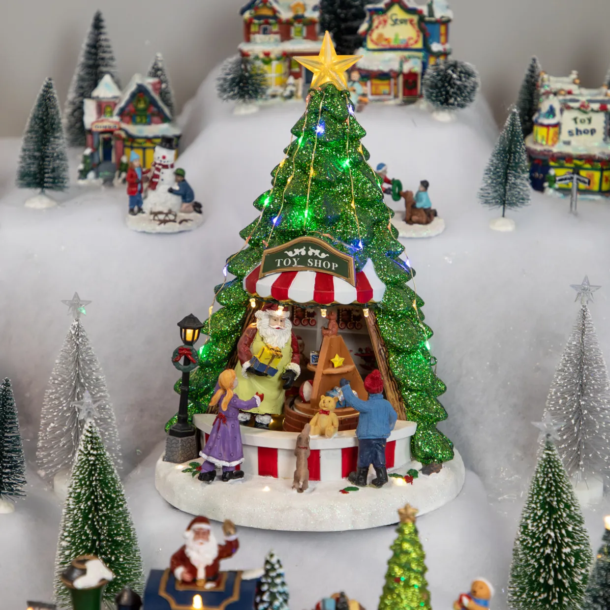 LED Lighted Animated and Musical Santa's Toy Shop Christmas Village Display - 13"