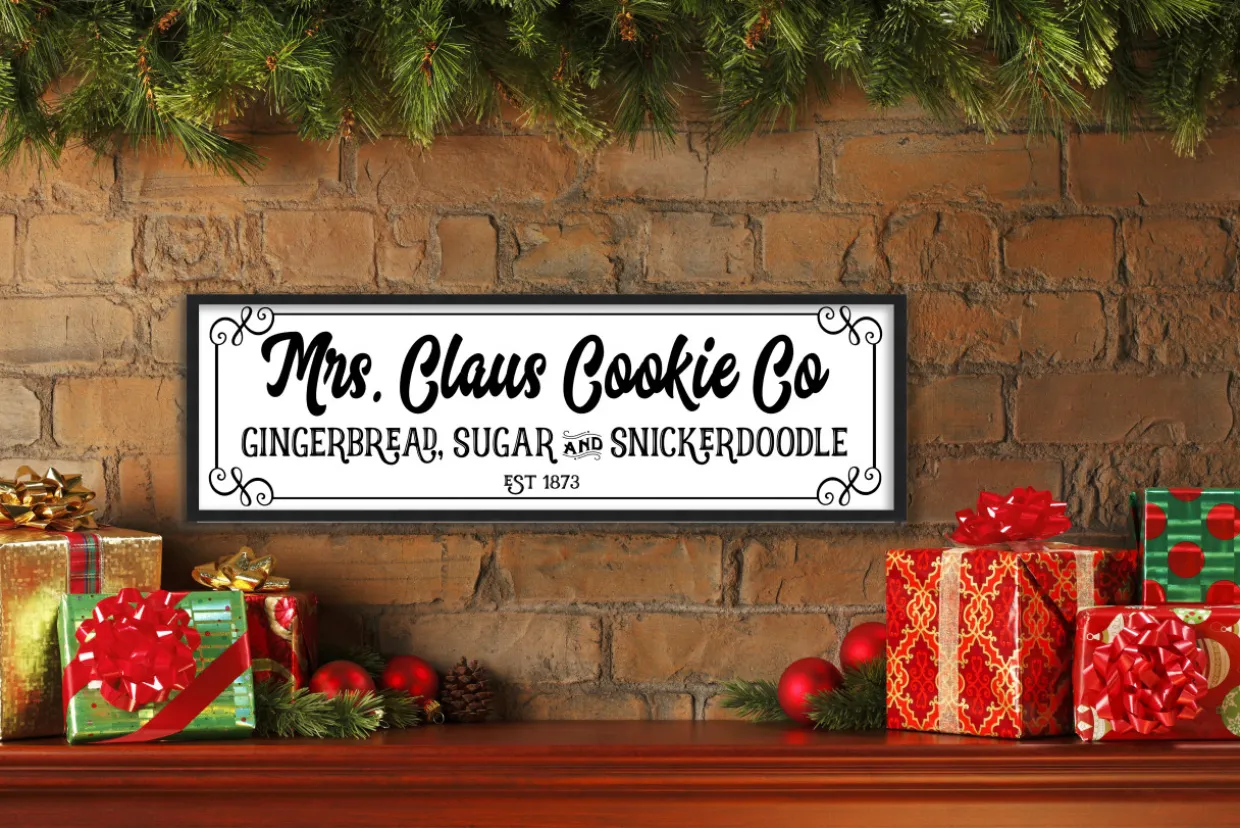 Mrs Claus Cookie Company 9.5" x 25.5" Framed Christmas Wall Decor Art Print Sign Poster in a Black Wooden Frame with UV Acrylic and Hangers