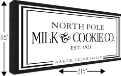 North Pole Milk and Cookie Company 11.5" x 21.5" Framed Christmas Wall Decor Sign Poster in a Black Wooden Frame with UV Acrylic and Hangers
