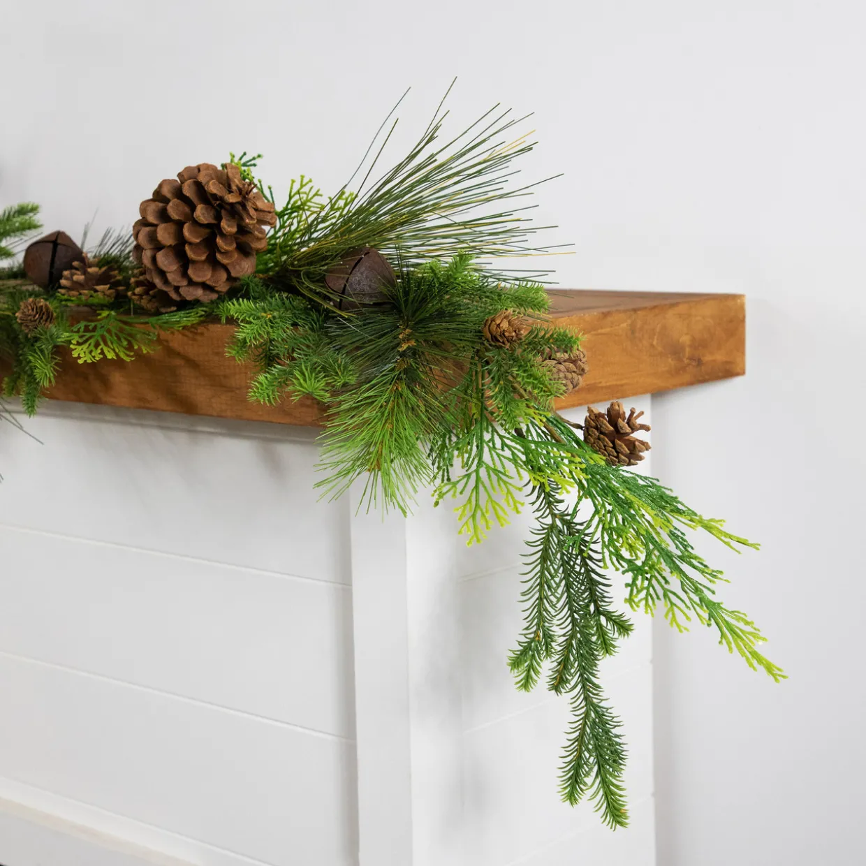 Real Touch™? Jingle Bells and Pinecones Artificial Christmas Garland - 5' x 10" - Unlit